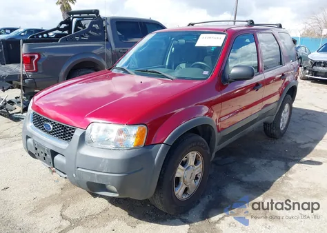 2003 Ford Escape Xlt z USA, uszkodzony, nr VIN 1FMYU93123KB74415